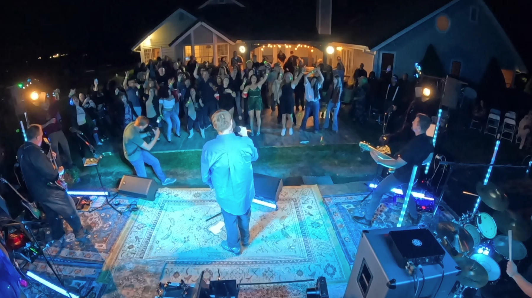 A large crowd gathered in front of the ranch stage